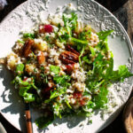 a plate of roasted apple farro salad
